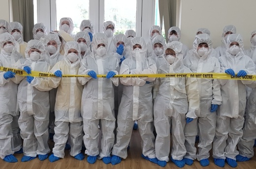 Police detectives and forensic officers